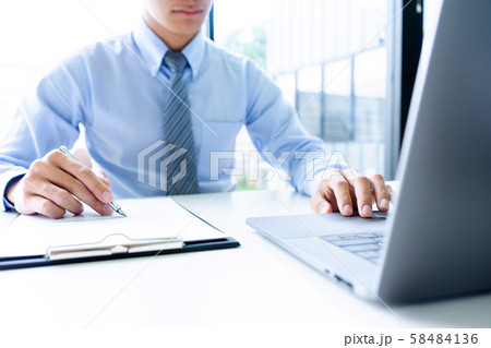 Businessman working with laptop for analyzing Businessman working with laptop for analyzing 58484136