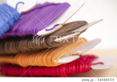 colorful stacking cotton yarn wool on desk 58488554
