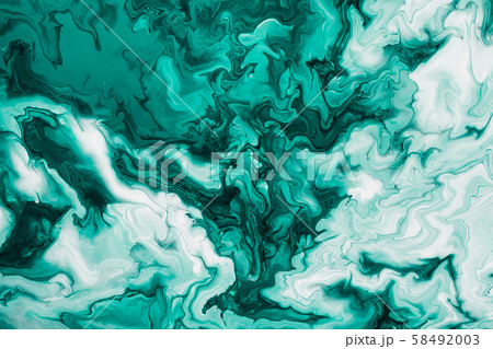 Free flowing green and white acrylic paint. Random 58492003