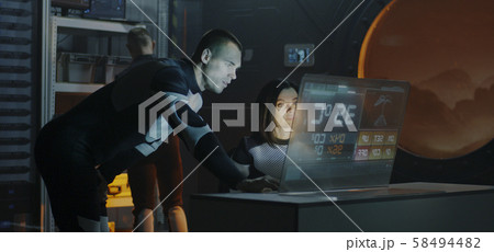 Astronaut analyzing plants living conditions 58494482