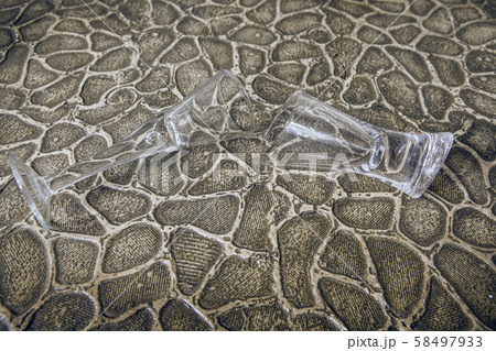 empty glass sharp stone background  58497933