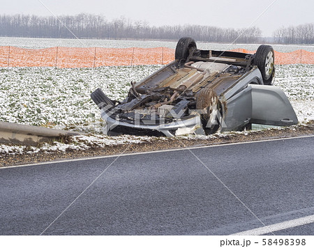 Overturned Car Beside the Road 58498398