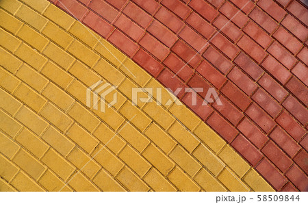 yellow and red brown paving tile for background or 58509844