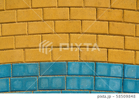 yellow and blue paving tiles for background or 58509848