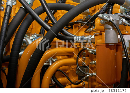 Close up view of hydraulic pipes of heavy industry 58511175