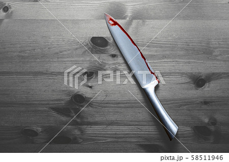 knife with grunge of blood on wood floor, halloween bloody murder or death crime killer violation 58511946