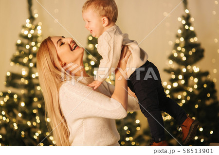Mom play with her cute little son on holiday. Chrisrmas mood 58513901