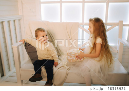 Brother and sister spent time together on holiday. Christmas time 58513921