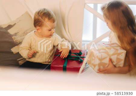 Brother and sister spent time together on holiday. Christmas time 58513930