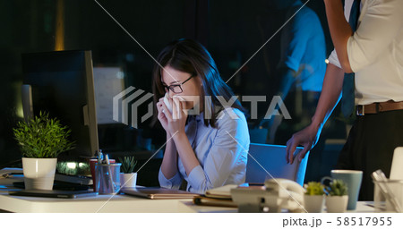 businesswoman sick while working 58517955