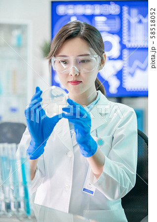 Asian scientist take petri dish Asian scientist take petri dish 58518052