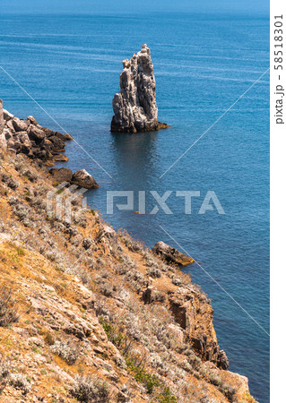 Seascape with a rock on the southern coast of Crimea 58518301