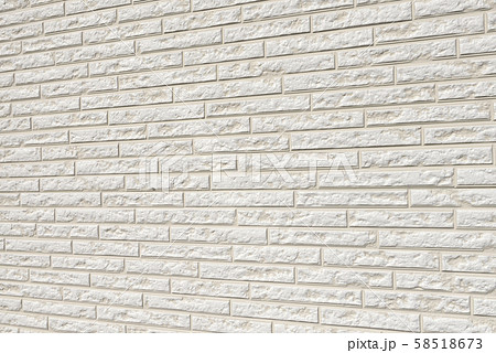 白い壁 薄いグレー の背景素材の写真素材