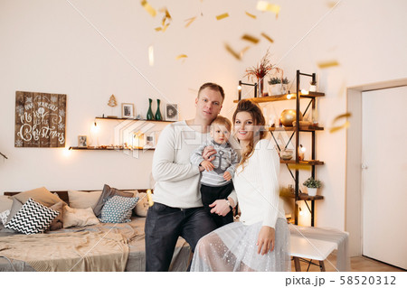 Happy parent standing with little child and Happy parent standing with little child and 58520312