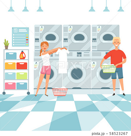 Laundry background. Woman washing clothes in the Laundry 58523267