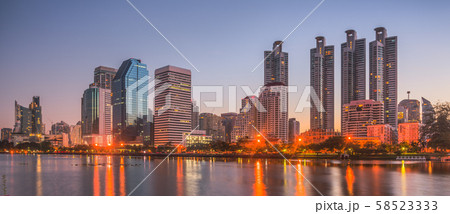 Lake in City Park under Skyscrapers at Twilight 58523333