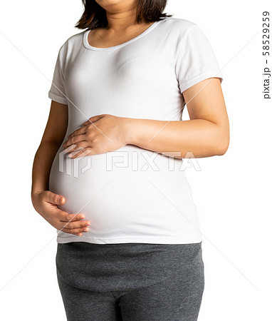 Happy pregnant woman isolated on white background. 58529259