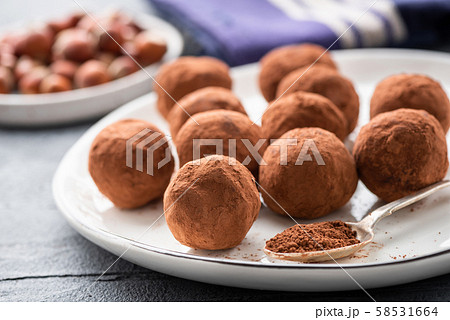 Homemade dark chocolate truffles 58531664