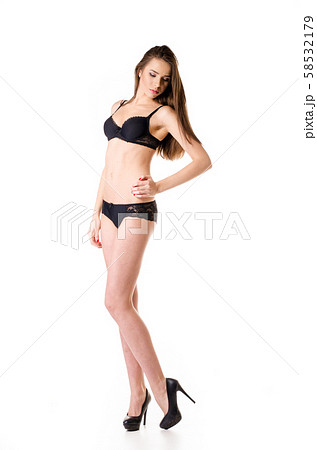 sexy girl in black lingerie on white background 58532179