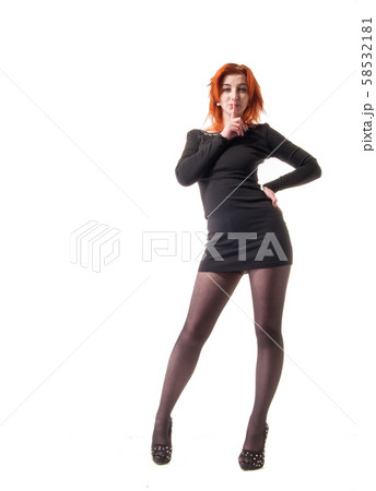 young woman in tight black dress on white background young woman in tight black dress on white background 58532181