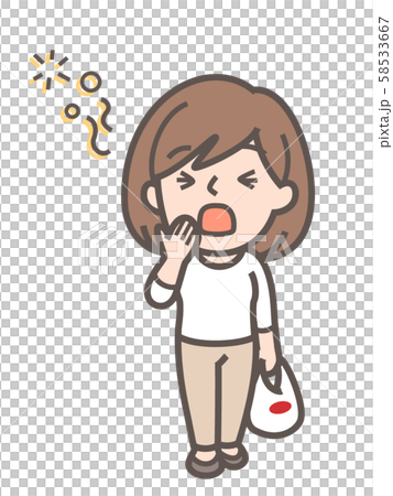 あくびをする女性　買い物帰り 58533667