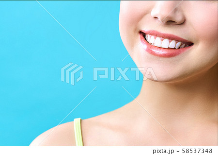 Perfect healthy teeth smile of a young woman. Teeth whitening. Dental clinic patient. Image Perfect healthy teeth smile of a young woman. Teeth whitening. Dental clinic patient. Image 58537348