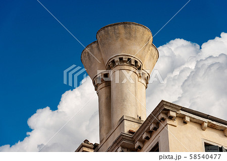 Venice Italy - Close-up of an ancient chimney on the roof Venice Italy - Close-up of an ancient chimney on the roof 58540477