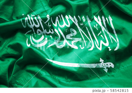 Flag Kingdom of Saudi Arabia by watercolor paint brush on canvas fabric, grunge style 58542815