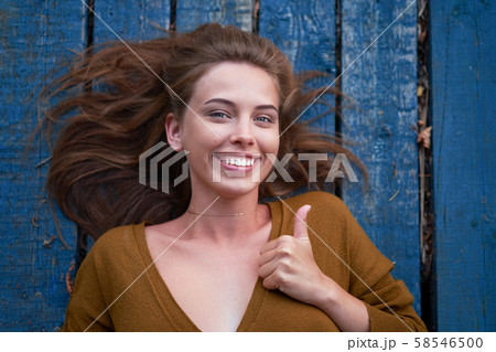 Beautiful caucasian young woman Lying on her back 58546500