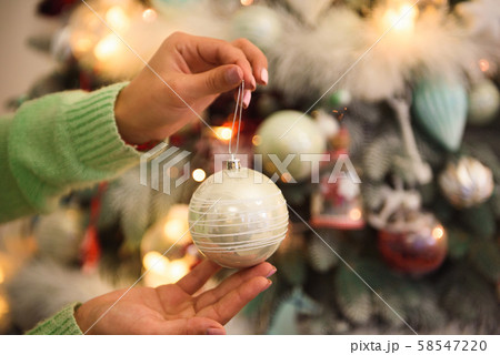 Holidays, celebration and people concept - young woman over christmas interior background. Holidays, celebration and people concept - young woman over christmas interior background. 58547220