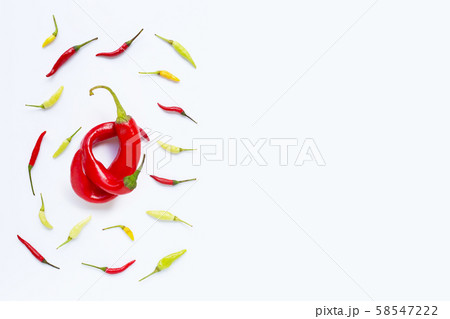 Different chili on white background. Different chili on white background. 58547222