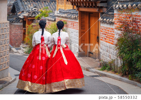 Korean lady in Hanbok or Korea dress and walk in 58550332