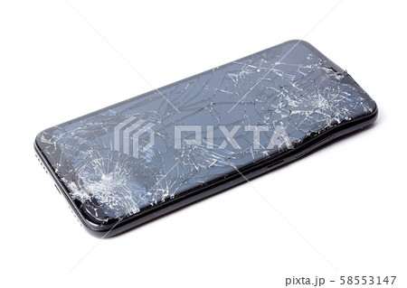 Mobile smartphone with broken screen isolated on white. 58553147