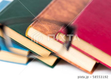 look at books through glasses as a background look at books through glasses as a background 58553192