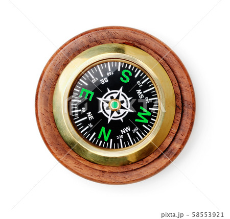 Wooden compass isolated on white Wooden compass isolated on white 58553921