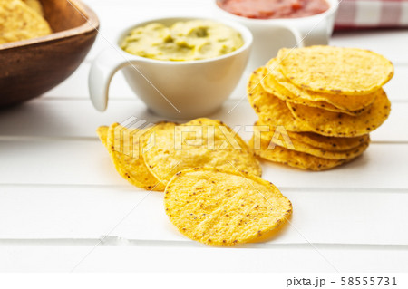 Round nacho chips. Yellow tortilla chips 58555731
