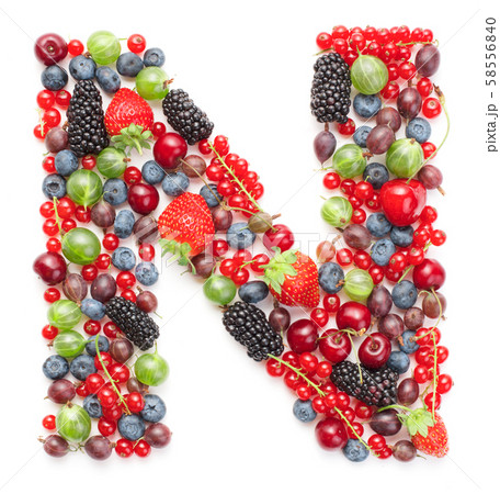 letter made of fresh ripe berry fruits 58556840