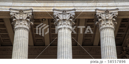 Vintage Old Justice Courthouse Column. Neoclassical colonnade with corinthian columns as part of a Vintage Old Justice Courthouse Column. Neoclassical colonnade with corinthian columns as part of a 58557896