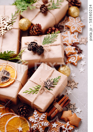 Christmas gift boxes with handmade decorations 58560234