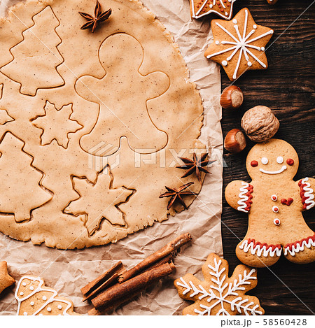 Gingerbread dough with food decorations background Gingerbread dough with food decorations background 58560428