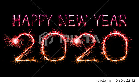 2020 happy new year fireworks written sparklers at 58562242