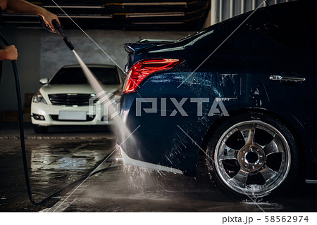 Cleaning the car (Car detailing) at car care shop 58562974