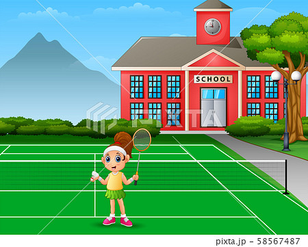 Happy girl playing badminton at school court 58567487