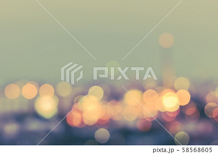 Vintage style blur city background rooftop view of cityscape business building landscape night lights bokeh Vintage style blur city background rooftop view of cityscape business building landscape night lights bokeh 58568605