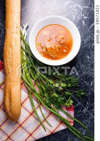 Vegetables and meat in red beetroot soup or borsch Vegetables and meat in red beetroot soup or borsch 58571821