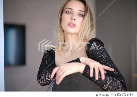 Beauty woman with perfect smile looking at camera Beauty woman with perfect smile looking at camera 58571847