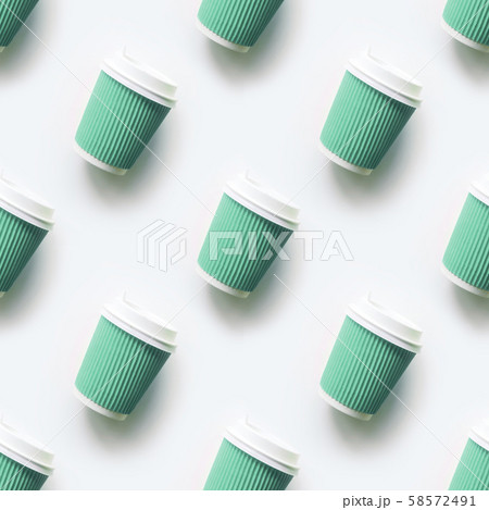 Many green cup of coffee takeaway paper cups as seamless pattern on white. Flat lay. Top view. Many green cup of coffee takeaway paper cups as seamless pattern on white. Flat lay. Top view. 58572491