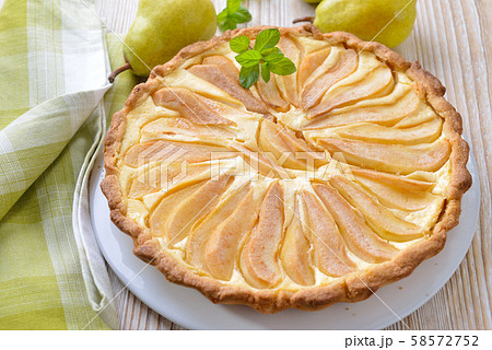 Home baked French style dessert pear tart with curd cheese 58572752