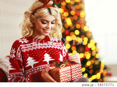 happy girl gets ready for christmas and packs happy girl gets ready for christmas and packs 58575771