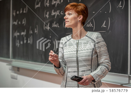 Young teacher to lecture at universities. Teaching mathematics 58576779